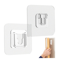 Wieszak Uniwersalny do pilota /telefonu /przedłużacza itp. - 57x57mm - samoprzylepny dwuczęściowy uchwyt